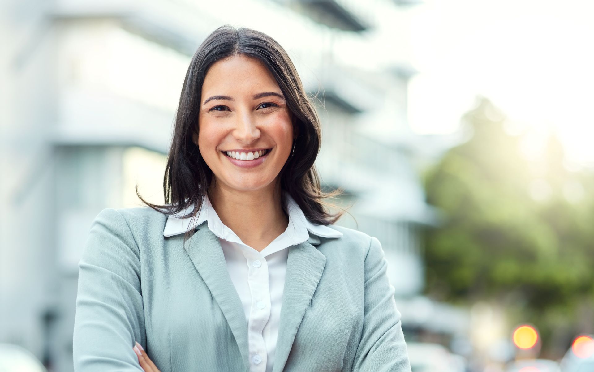 portrait-of-a-confident-young-businesswoman-standi-2023-11-27-05-36-51-utc