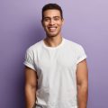 waist-up-shot-of-handsome-cheerful-man-with-toothy-2025-01-24-00-26-53-utc Waist up shot of handsome cheerful man with toothy smile, muscular arms, being in high spirit as spends free time with friends or girlfriend, wears casual white t shirt, isolated over purple wall SSUCv3H4sIAAAAAAAEAJ2RyW7DIBCG75X6DhbnWPKSGCevEvUwLIlRCEQsrawo714woZpzb8z3M8s/8/z8aBrCwCtOTs0zRylWWkcfHARlTcLd7s2dNEI6TKRQwToFGkMGgS8G7jJBE7XO+LWJxAcI0Uufm70RhyCvqUaBfyXKROcSN1XYxJSRJEJ2iPnINlbRa/fvzPL4qm7gKg1ft4GRESe1hGLkXL6S20+Q7o6tQRTKIlffloPOH0ZU6eEUV+aK0mxYti3XNG6jCW7FkxNt7QOYziu+pJqy8gW8T99F5agRTze1d9TH2LAZeFclIl0ih/3YH6epnw506Og8HqaZ1OtZflMCWywHXVSS3Iq4yhOQ/ZENo6RTS0dB2/0goJ0vA207PjLesYHSmaXFv34BlaKBkocCAAA=
