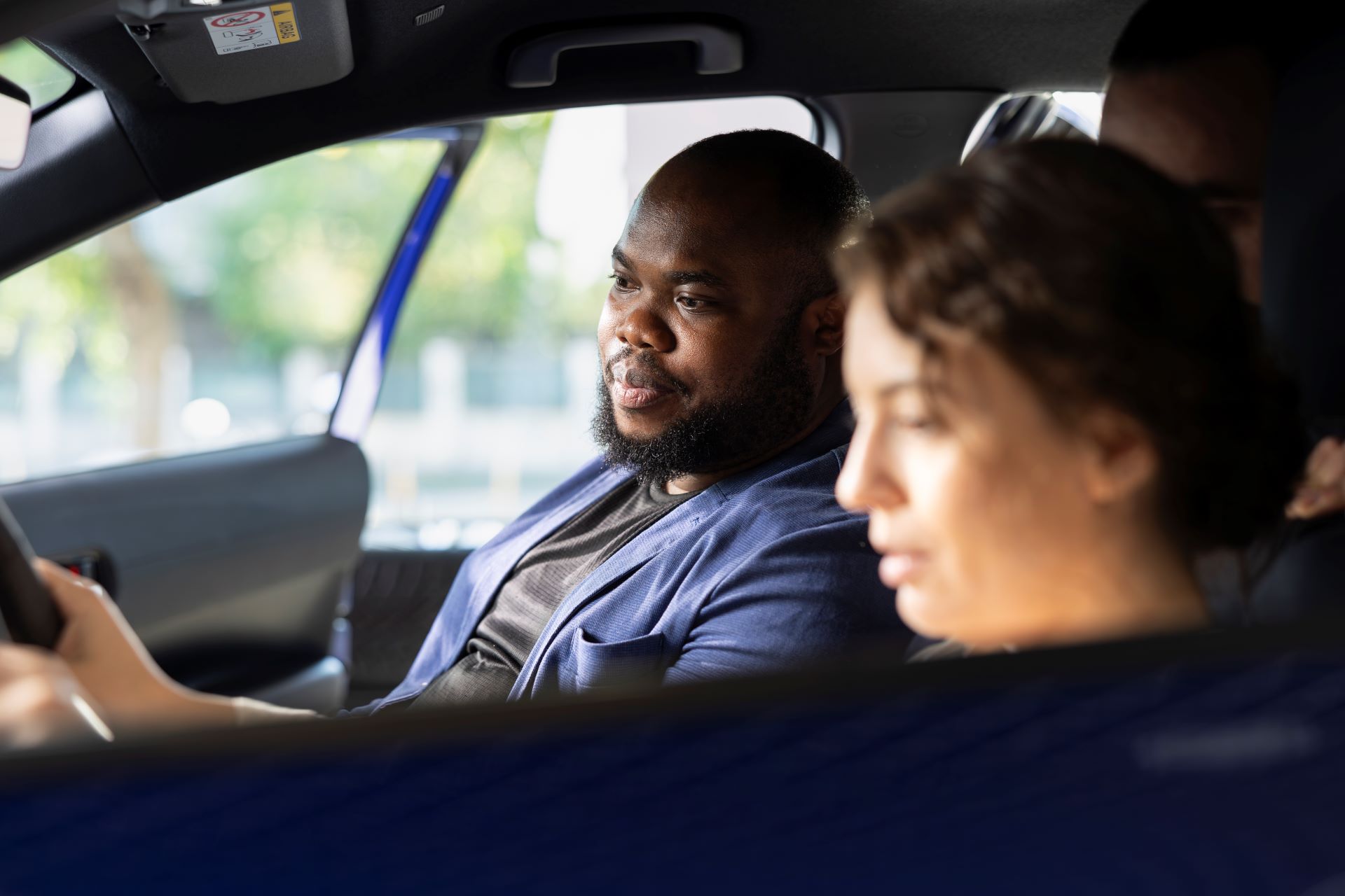 agent-persuading-hesitant-customers-to-buy-vehicle-2025-02-20-02-23-53-utc