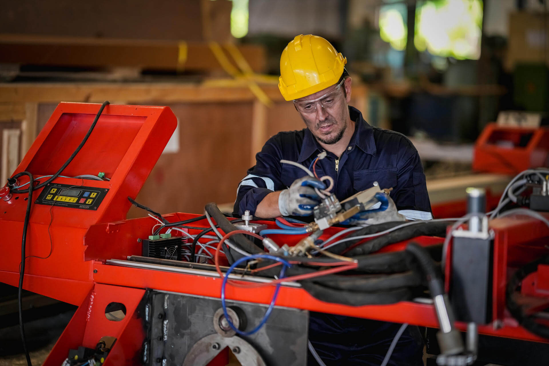 robotic-arm-engineer-check-on-equipment-in-its-wit-2025-01-29-10-43-11-utc