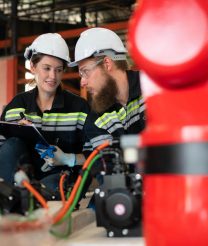 both-of-engineers-installing-a-small-robotic-arm-i-2025-01-09-01-19-19-utc both-of-engineers-installing-a-small-robotic-arm-i-2025-01-09-01-19-19-utc