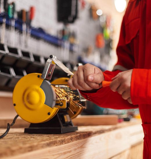 close-up-builder-using-knife-sharpener-in-workshop-2024-10-18-09-24-38-utc close-up-builder-using-knife-sharpener-in-workshop-2024-10-18-09-24-38-utc