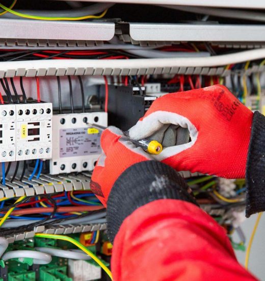 closeup-of-hands-in-gloves-doing-electrical-instal-2025-02-02-20-22-10-utc closeup-of-hands-in-gloves-doing-electrical-instal-2025-02-02-20-22-10-utc