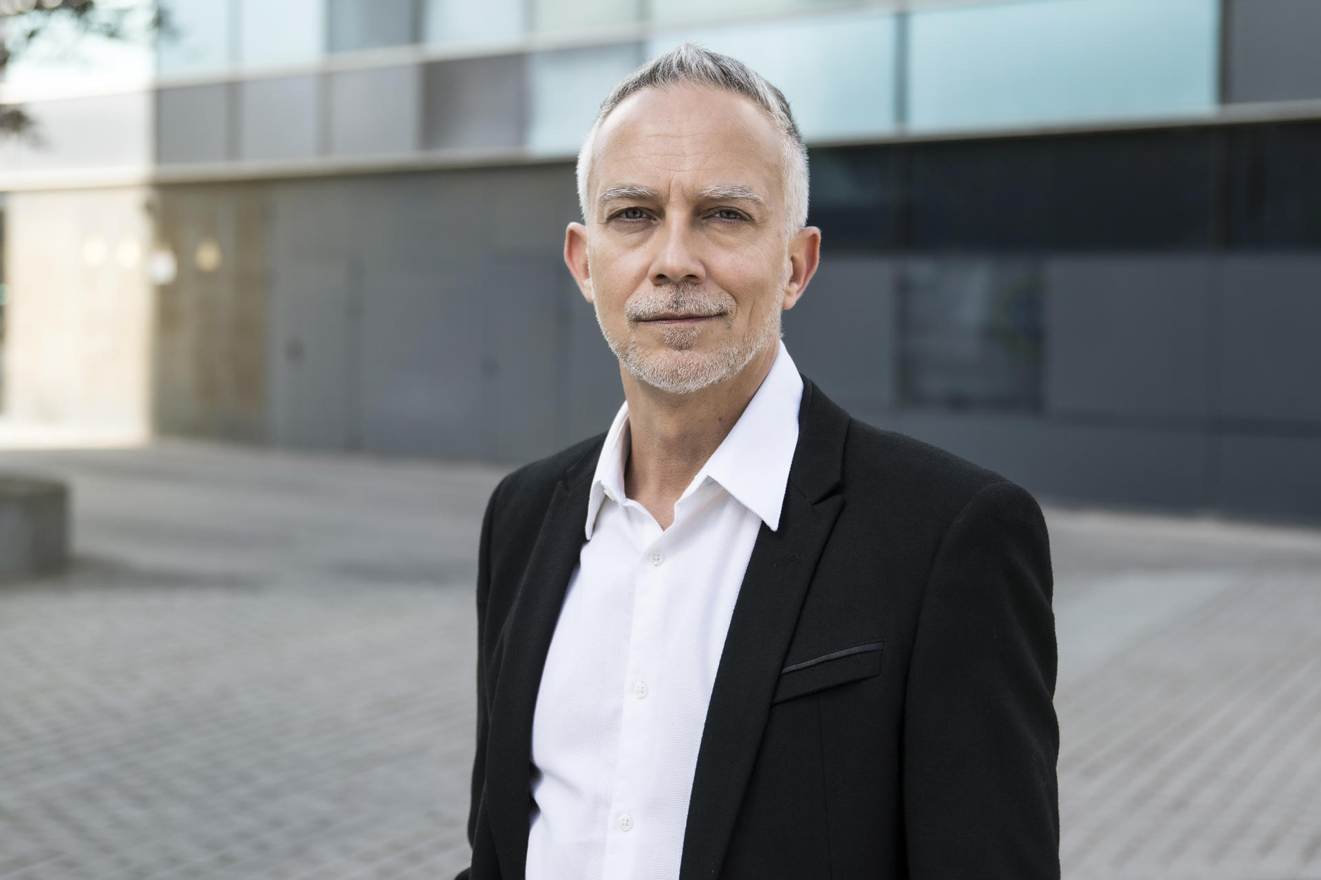 Portrait of a handsome senior businessman standing at outdoors. Mature corporate confident executive looking at camera. Financial concept Portrait of a handsome senior businessman standing at outdoors. Mature corporate confident executive looking at camera. Financial concept . High quality photo