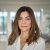 Confident smiling professional mid aged business woman in office, portrait. Confident smiling Latin professional mid aged elegant business woman corporate leader, happy beautiful mature female executive, lady manager standing in office looking at camera, headshot portrait.