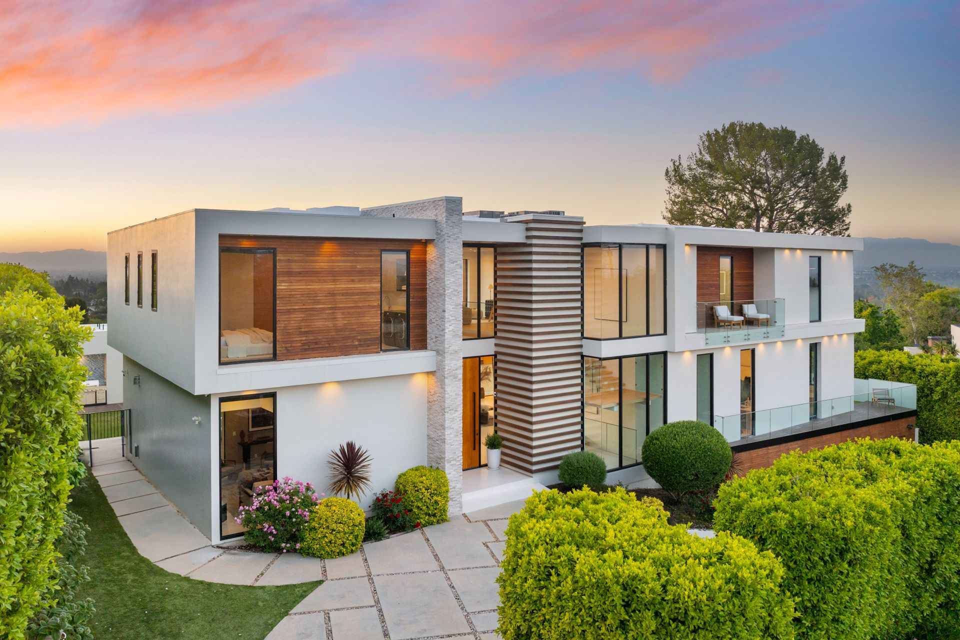 contemporary-two-level-home-on-hillside-with-shrub-2024-06-18-18-49-05-utc_11zon