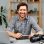young-man-photographer-sits-at-table-and-works-fro-2025-02-24-20-05-58-utc