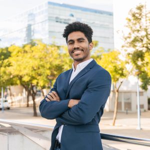 confident-ethnic-man-standing-on-city-street-2025-01-10-03-58-00-utc confident-ethnic-man-standing-on-city-street-2025-01-10-03-58-00-utc