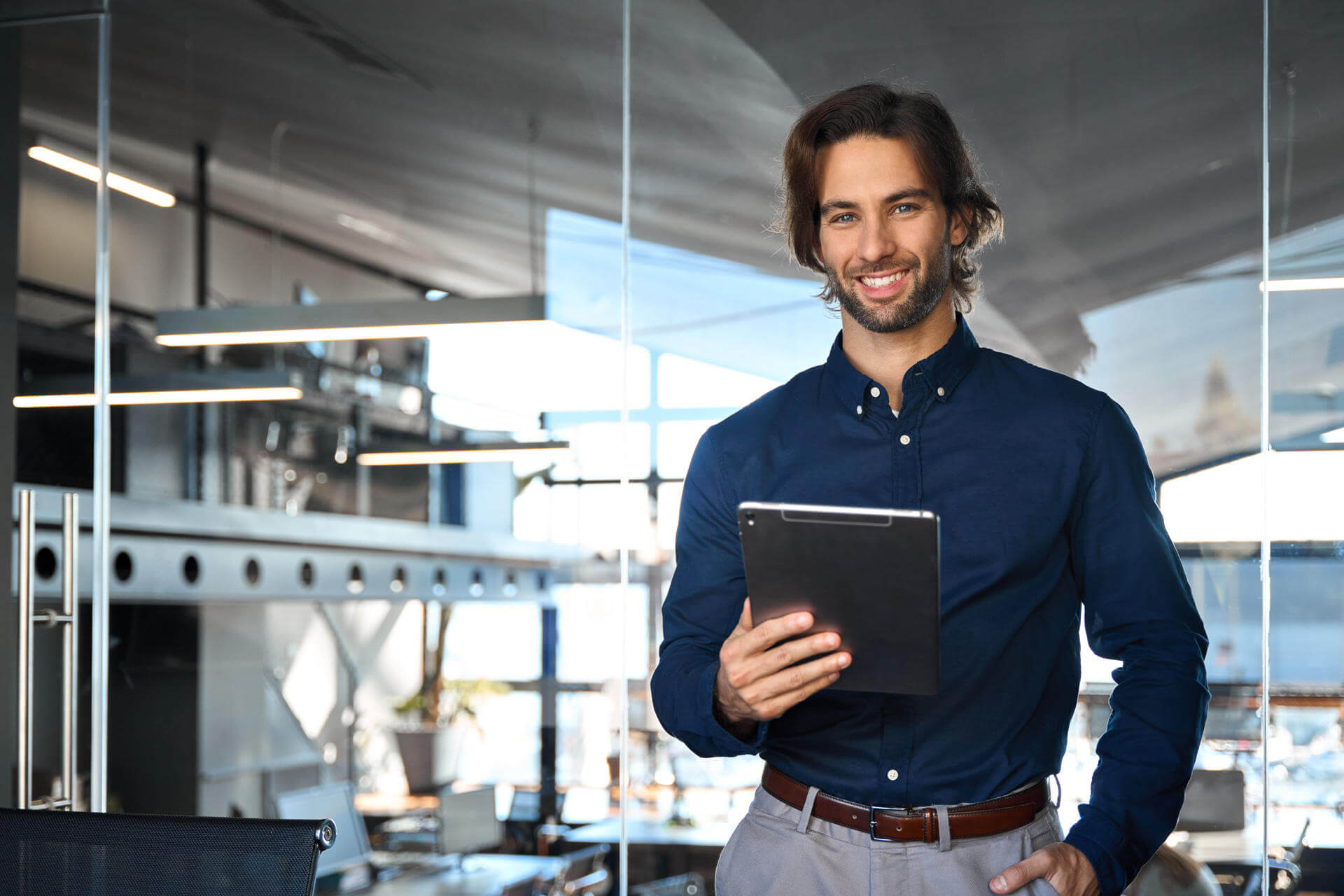 happy-young-business-man-manager-using-digital-tab-2025-02-11-15-57-07-utc