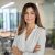 Smiling confident Latin professional mature business woman in office, portrait. Smiling confident Latin professional mid aged business woman in 40s, corporate leader, happy mature female executive, lady manager standing in office arms crossed looking at camera, vertical portrait.