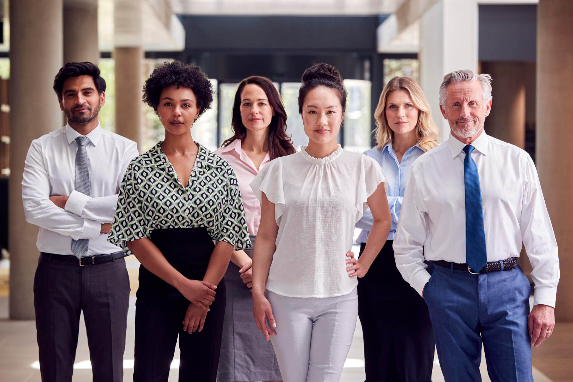 portrait-of-multi-cultural-business-team-inside-mo-2024-10-19-04-38-27-utc