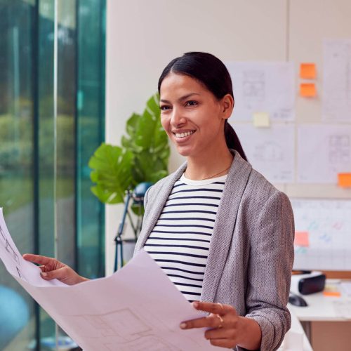female-architect-standing-in-office-looking-at-bui-2024-10-22-13-42-48-utc female-architect-standing-in-office-looking-at-bui-2024-10-22-13-42-48-utc