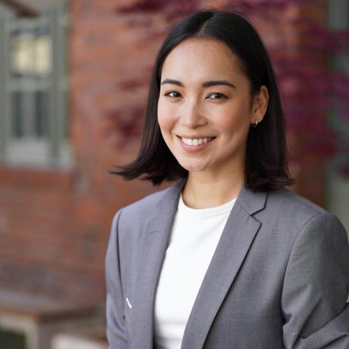 smiling-young-asian-woman-professional-manager-wea-2025-02-11-16-20-21-utc smiling-young-asian-woman-professional-manager-wea-2025-02-11-16-20-21-utc