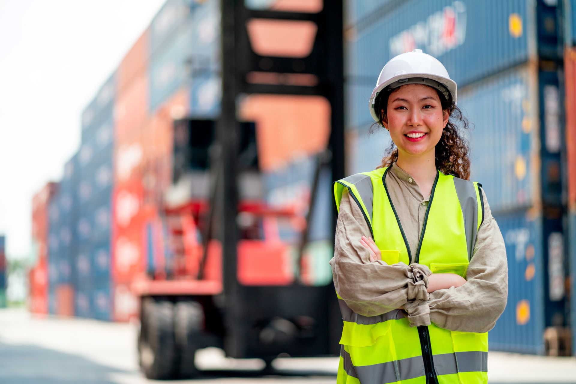 portrait-of-asian-cargo-container-worker-or-techni-2023-11-27-04-50-56-utc