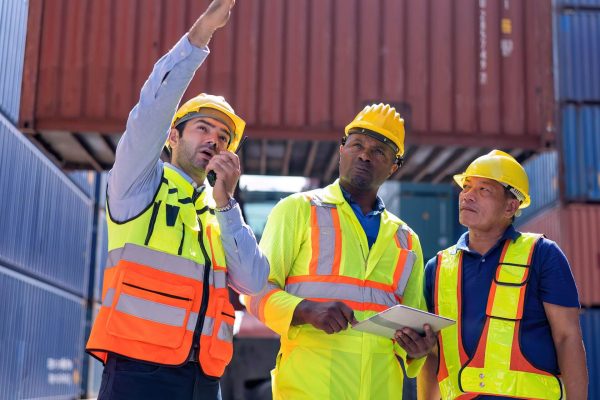 engineer-working-in-container-storage-yard-stand-f-2024-10-13-07-40-04-utc