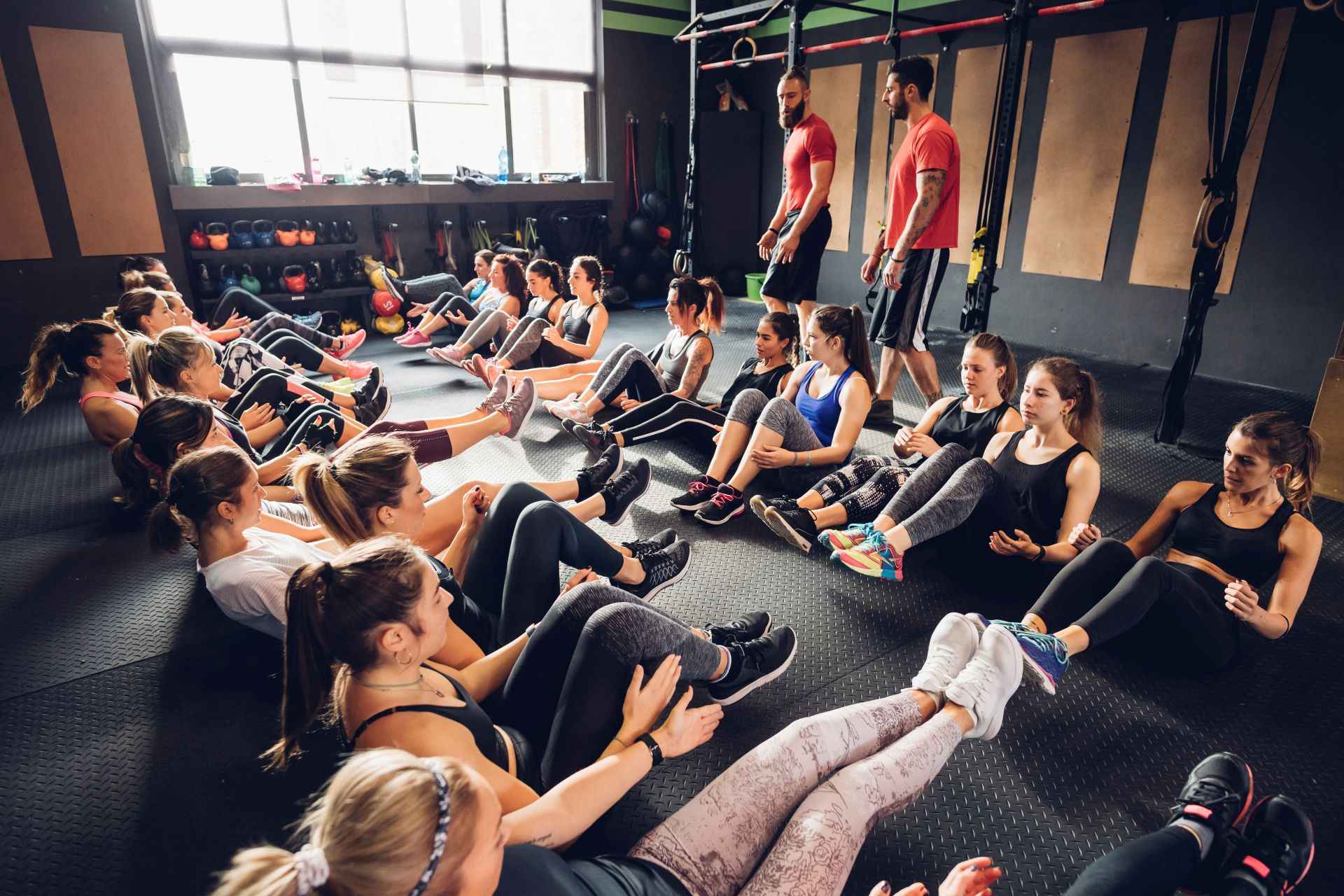 large-group-of-women-training-in-gym-with-male-tra-2024-07-03-01-25-31-utc_11zon