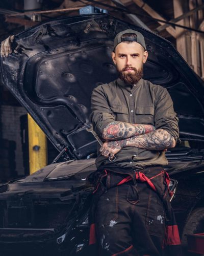 two-bearded-auto-mechanic-working-in-repair-garage-2025-01-26-10-54-43-utc two-bearded-auto-mechanic-working-in-repair-garage-2025-01-26-10-54-43-utc