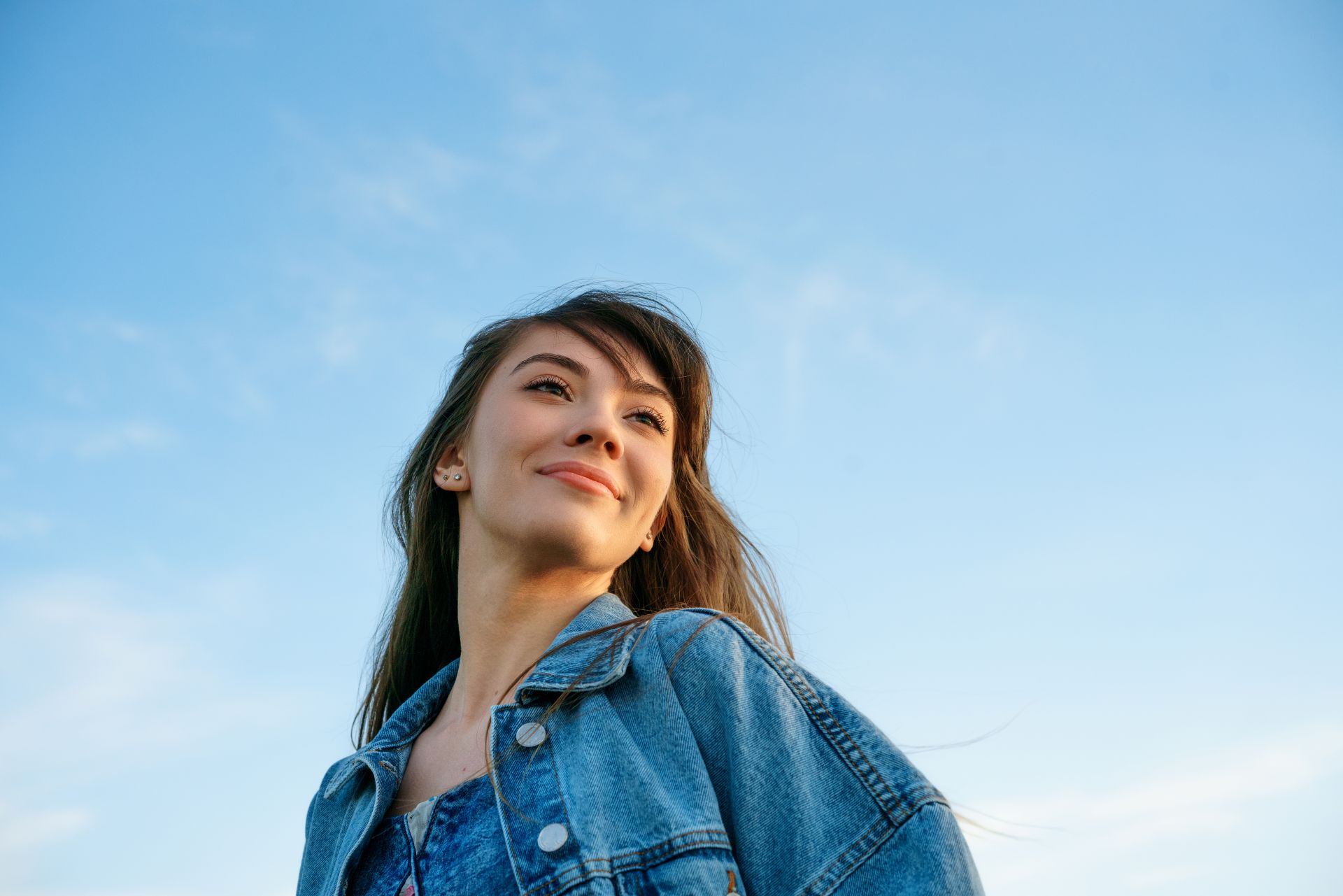 portrait-of-a-young-woman-against-the-sky-2024-11-25-16-13-04-utc