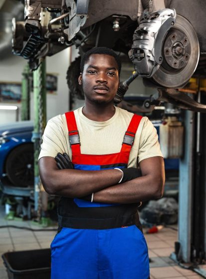 african-man-mechanic-in-uniform-at-the-car-repair-2025-02-24-19-02-45-utc