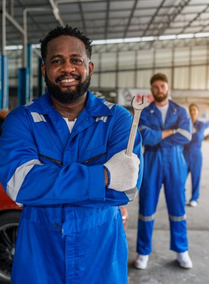 portrait-of-man-auto-mechanic-working-at-car-repai-2024-07-09-00-54-05-utc