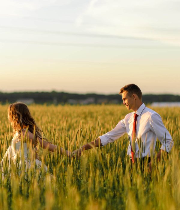 bride-and-groom-in-a-wheat-field-a-woman-leads-a-2024-10-18-05-33-24-utc bride-and-groom-in-a-wheat-field-a-woman-leads-a-2024-10-18-05-33-24-utc